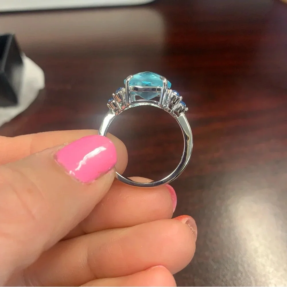 Avon Emmy cocktail ring with gemstone accents sz 10 aquamarine silver tone
